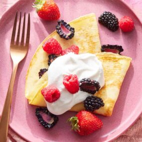 Plate of Crepe ice cream and fruits